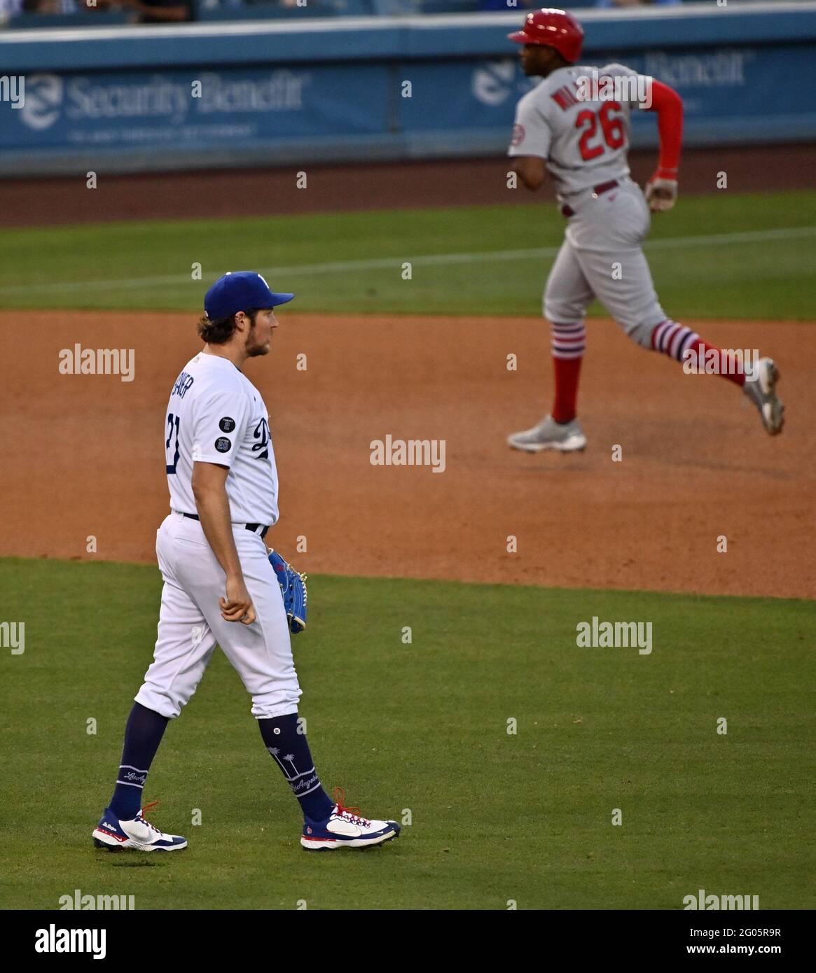 Los Angeles, United States. 01st June, 2021. St. Louis Cardinals' right fielder Justin Williams (26) rounds the bases after pulverizing a solo home-run off Los Angeles Dodgers' starting pitcher Trevor Bauer (L) during the sixth inning at Dodger Stadium in Los Angeles on Monday, May 31, 2021. Photo by Jim Ruymen/UPI Credit: UPI/Alamy Live News Stock Photo