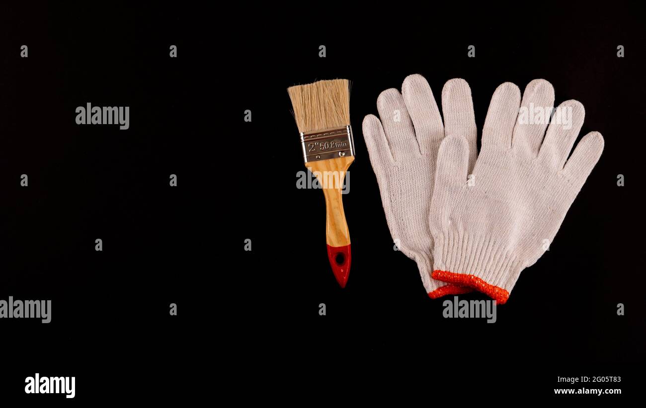 Essential Tools for Painting paint rollers and tray, brush, masking