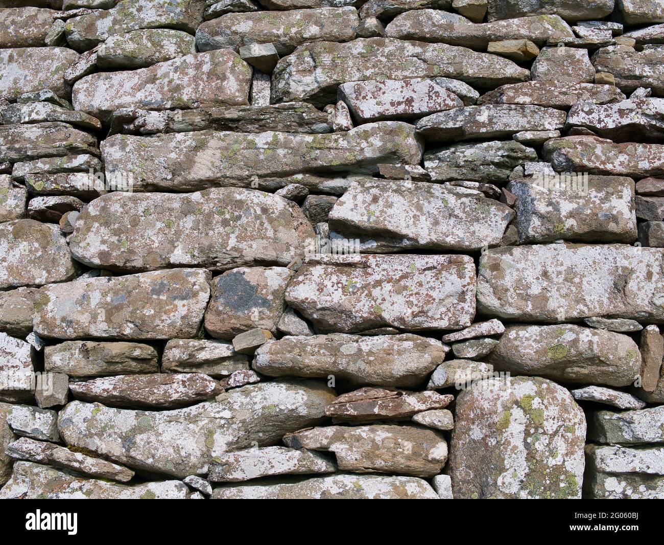 A close up of the dry stone wall structure of the Broch of Clickimin in Lerwick, Shetland, UK Stock Photo