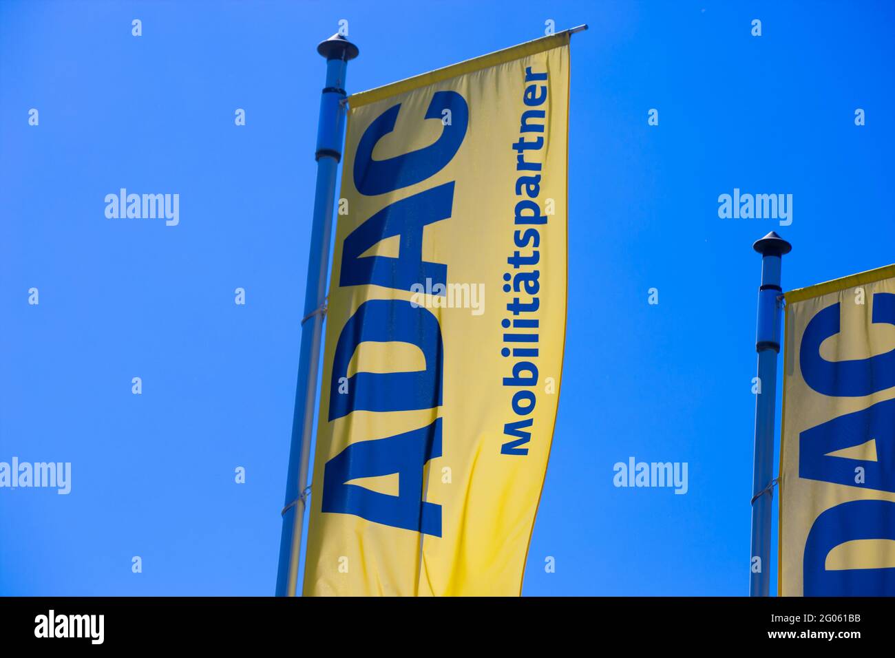 ADAC flags against a blue sky Stock Photo