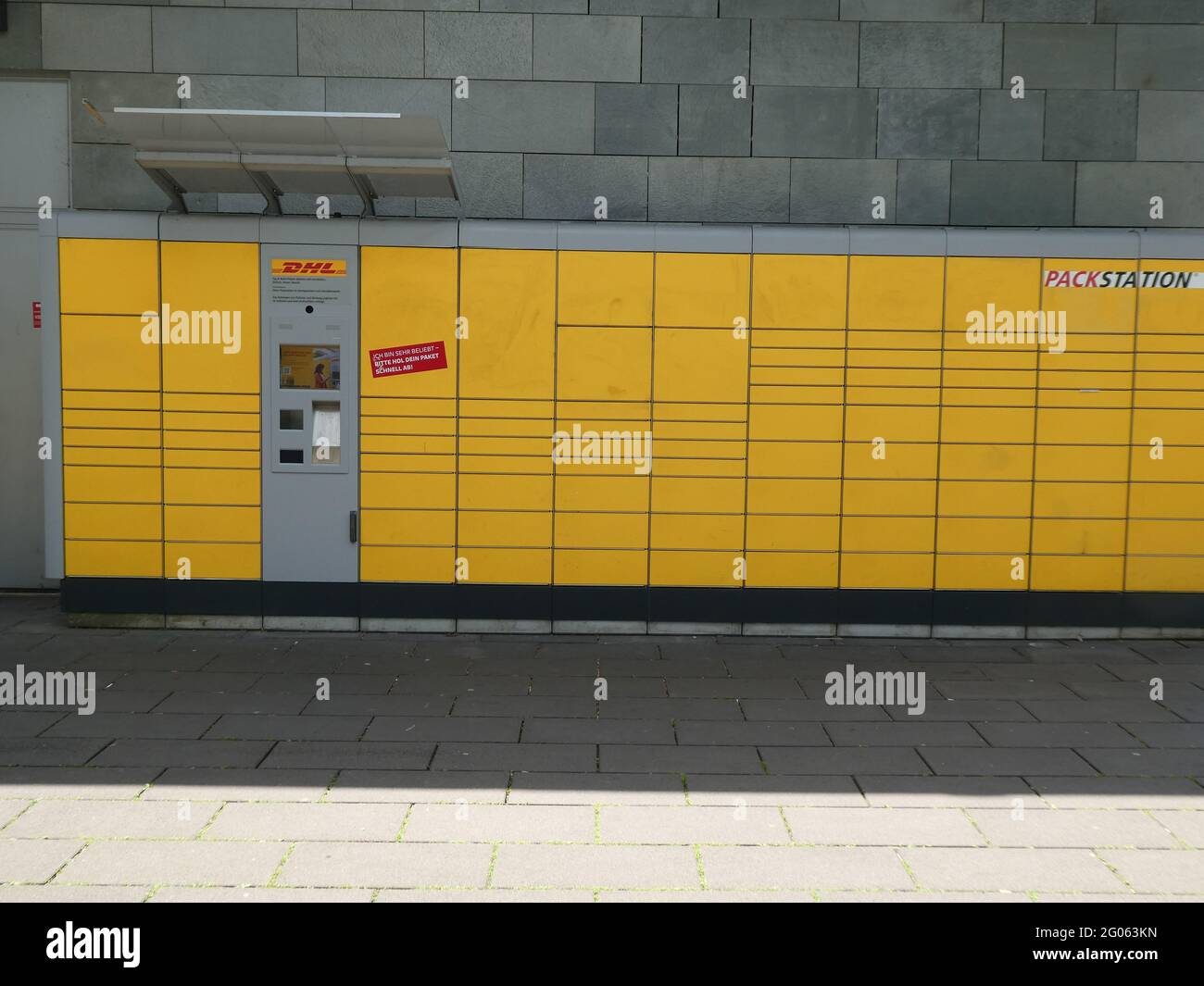 Cologne, Germany. 30th May, 2021. A Packstation, a parcel machine from DHL, the parcel and express service subsidiary of Deutsche Post AG. Credit: Horst Galuschka/dpa/Alamy Live News Stock Photo