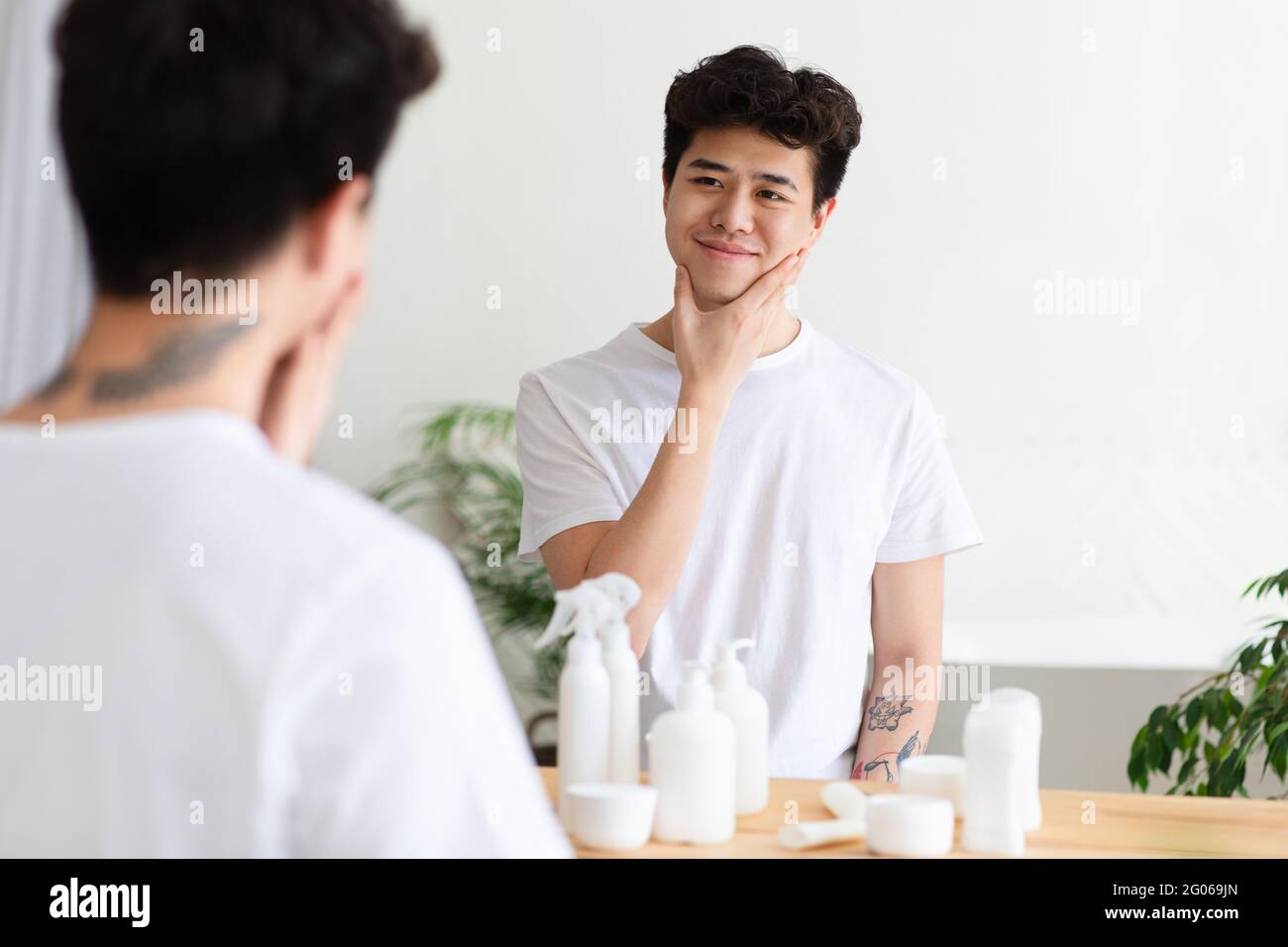 Cosmetics for men, skin care at home and clean face after shaving in morning Stock Photo
