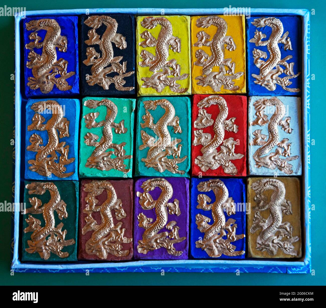 Box of colorful ink stone Stock Photo