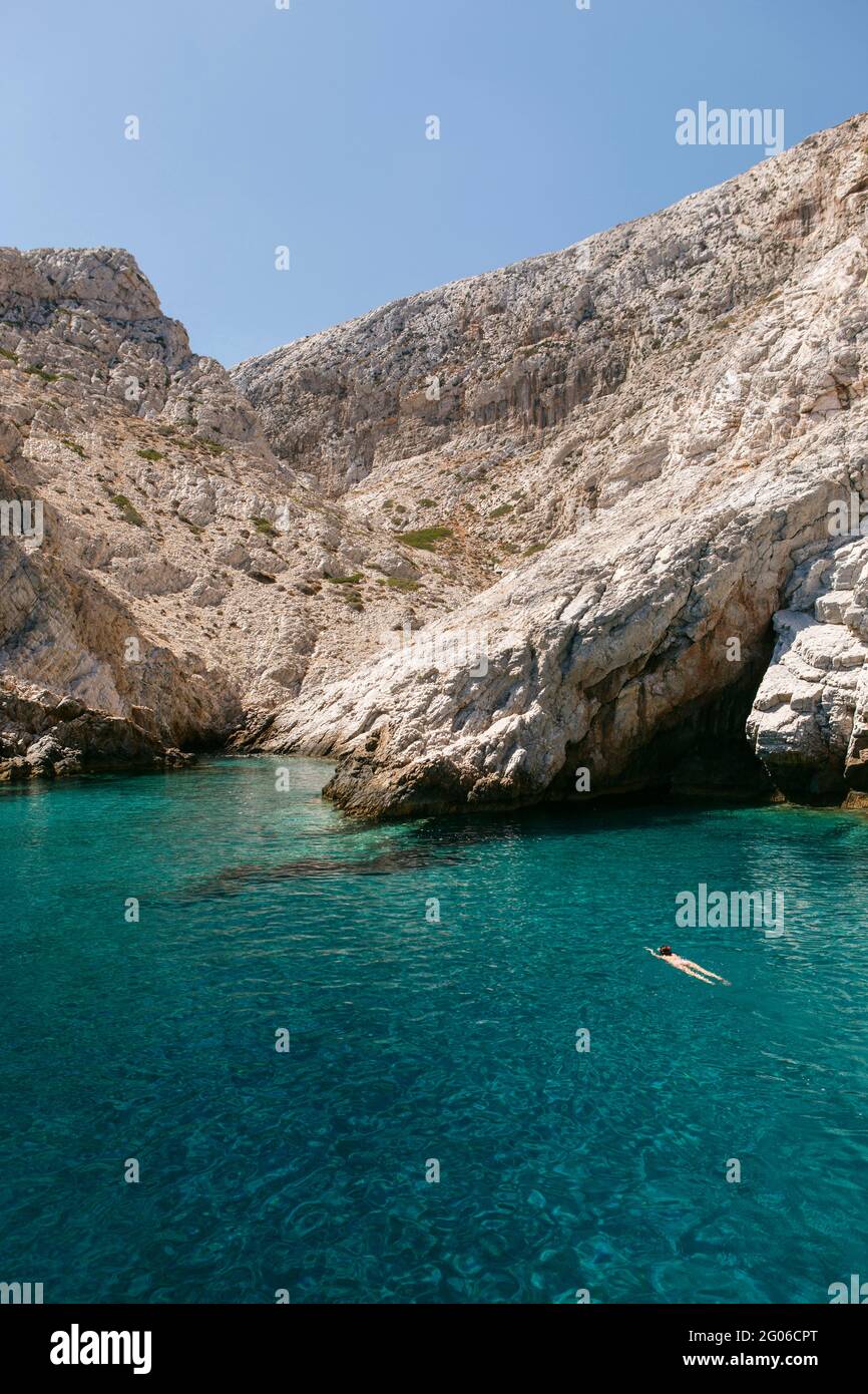 crystal clear water, cliffs on the north coast, Folegandros island, Cyclades, Aegean Sea, Greece, Europe Stock Photo