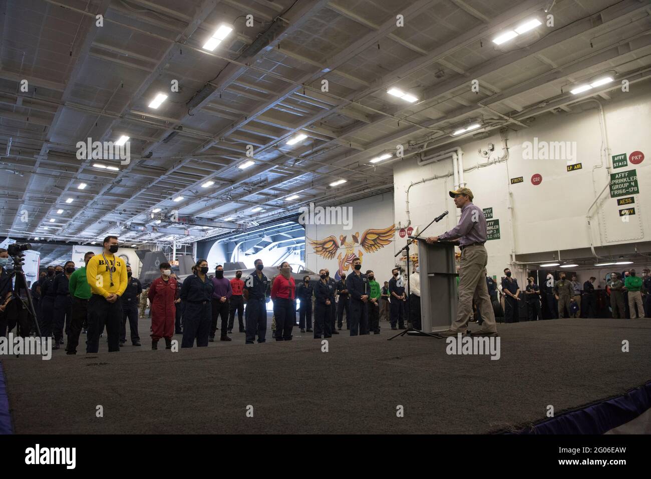 Reportage:  Defense Secretary Mark T. Esper speaks to sailors in an all-call on the Nimitz-class nuclear aircraft carrier USS Carl Vinson, underway in the Pacific Ocean, Sept. 17, 2020. Stock Photo