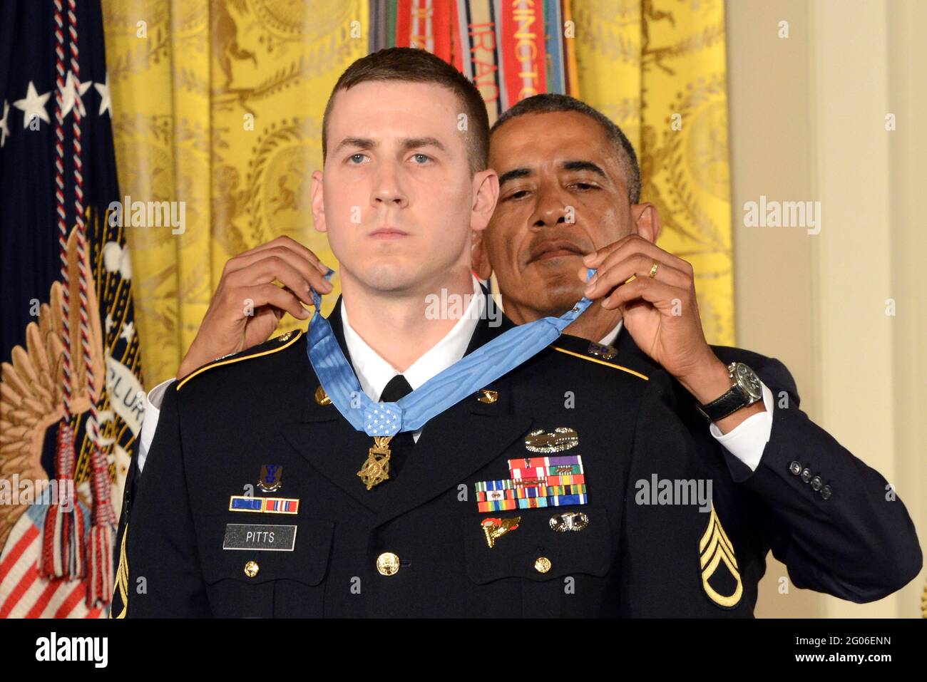 Reportage:  President Barack Obama awards the Medal of Honor to former U.S. Army Staff Sgt. Ryan M. Pitts, the White House, Washington, D.C., July 21, 2014. Pitts received the nation's highest military honor for his actions in 2008 in Wanat, Afghanistan, with 2nd Platoon, Chosen Company, 2nd Battalion (Airborne), 503rd Infantry Regiment, 173rd Airborne Brigade. www.army.mil/medalofhonor/pitts/profile/index.html Stock Photo
