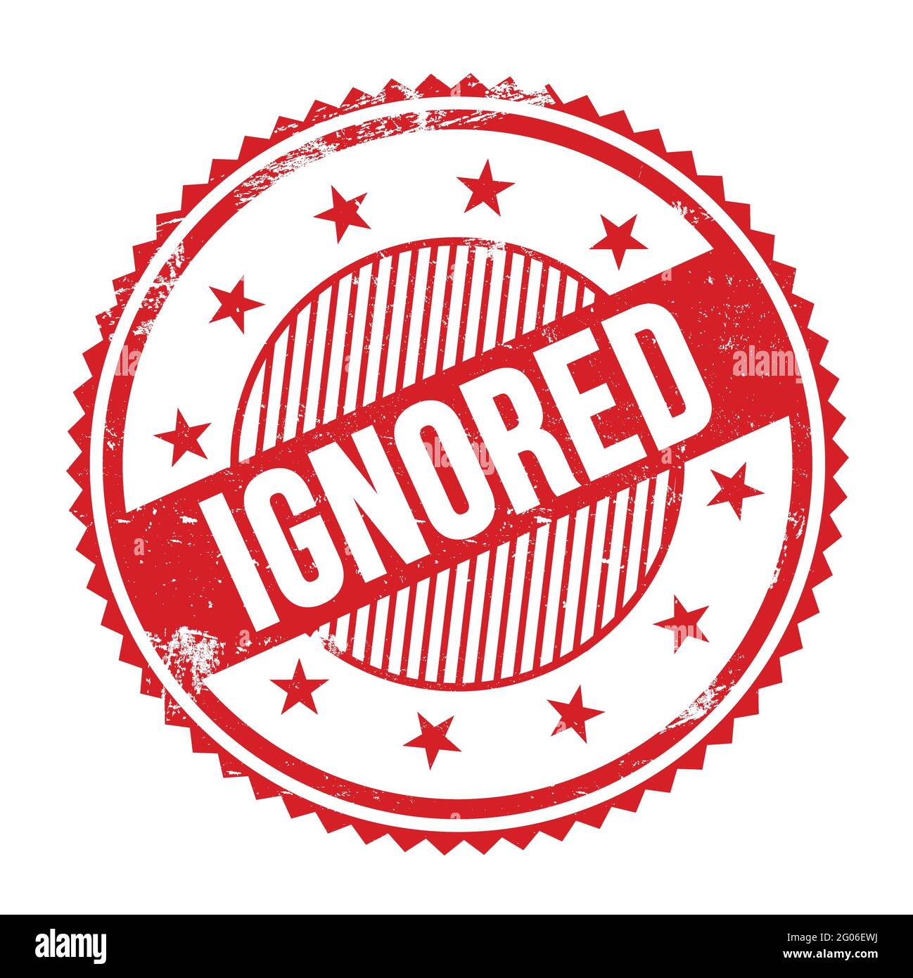 IGNORED text written on red grungy zig zag borders round stamp. Stock Photo