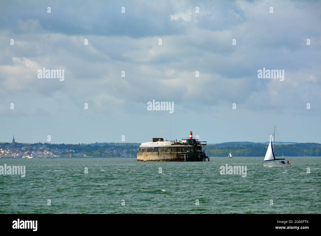 Spitbank fort in the Solent with Ryde on the Isle of Wight in the ...