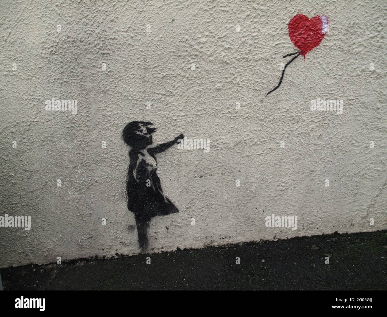 Banksy Girl with Red Balloon Stock Photo - Alamy