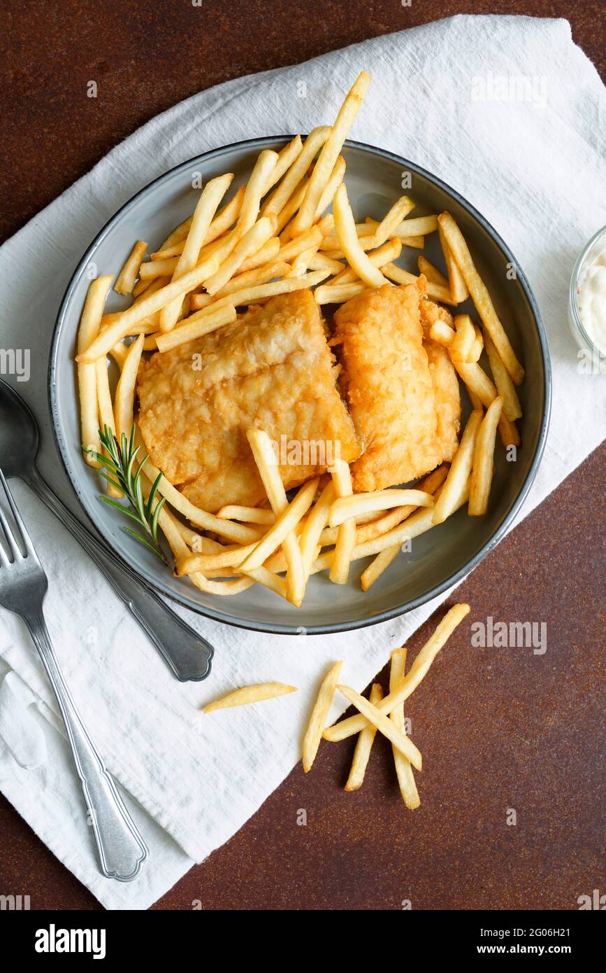 Fish & chips, breaded and fried cod with french fries and tartar sauce