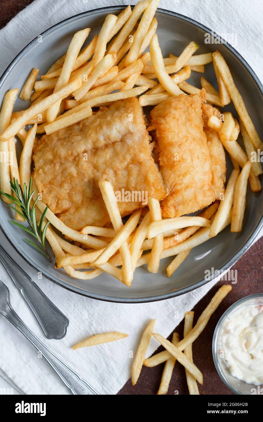 Fish & chips, breaded and fried cod with french fries and tartar sauce