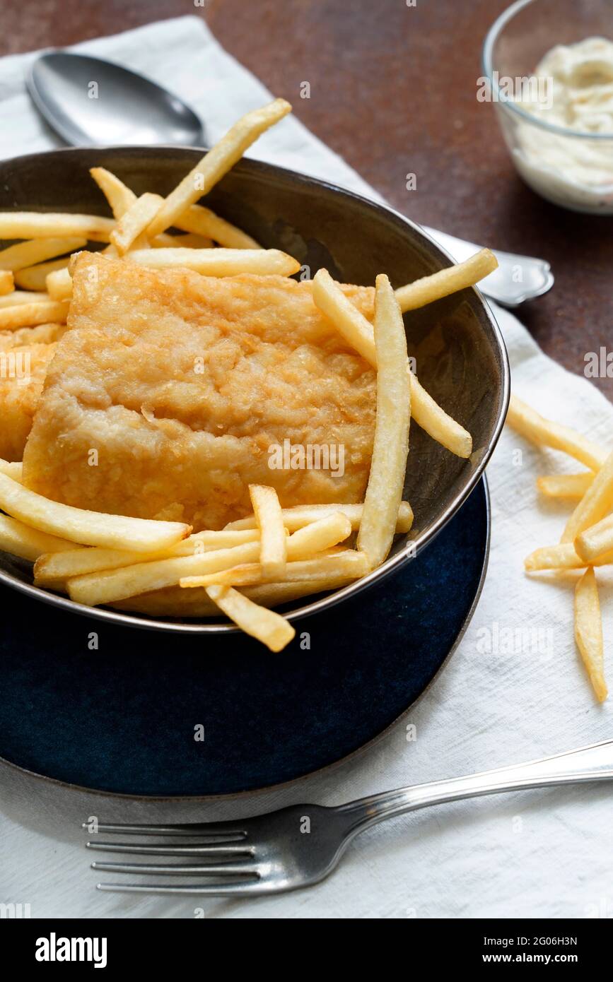 Fish & chips, breaded and fried cod with french fries and tartar sauce