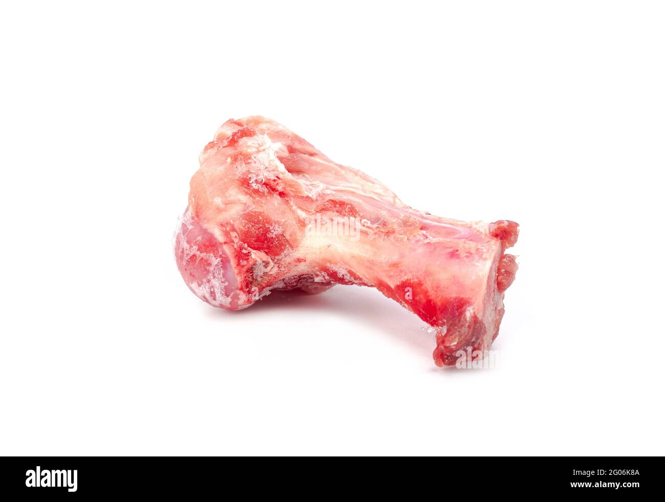 Close up frozen fresh pork bones with red meat stuck To be used for making pork bone broth on a