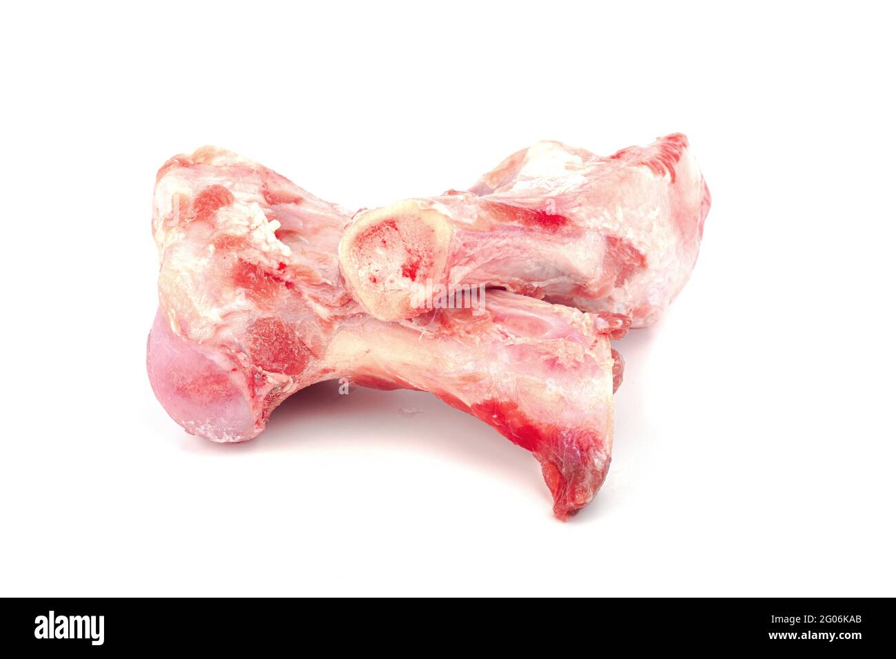 Close up frozen fresh pork bones with red meat stuck To be used for making  pork bone broth on a white background Stock Photo - Alamy