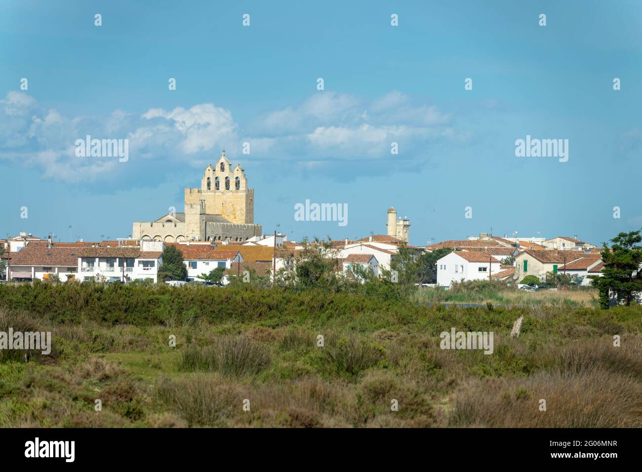 Village of Saintes- Maries-de-la-Mer and its church in the Camargue, Bouches- du-Rhone, South of France Stock Photo