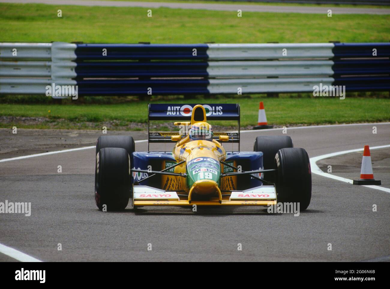 Roberto Moreno brings the Benetton B191 into the pit lane during practice  for the 1991 British Grand Prix at Silverstone Stock Photo - Alamy