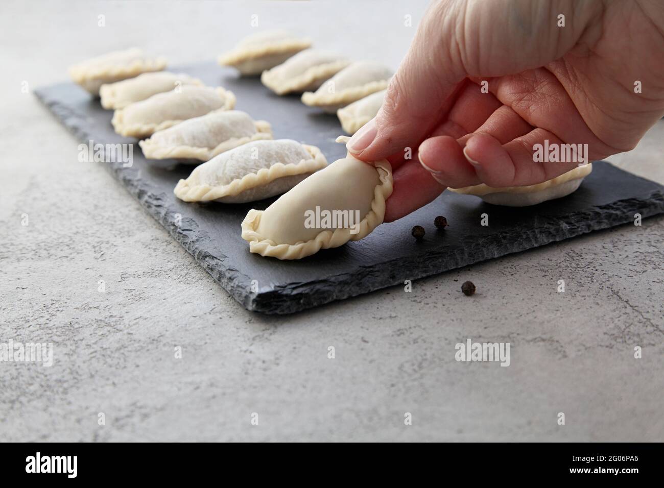 Chinese dumplings chef board hi-res stock photography and images - Alamy