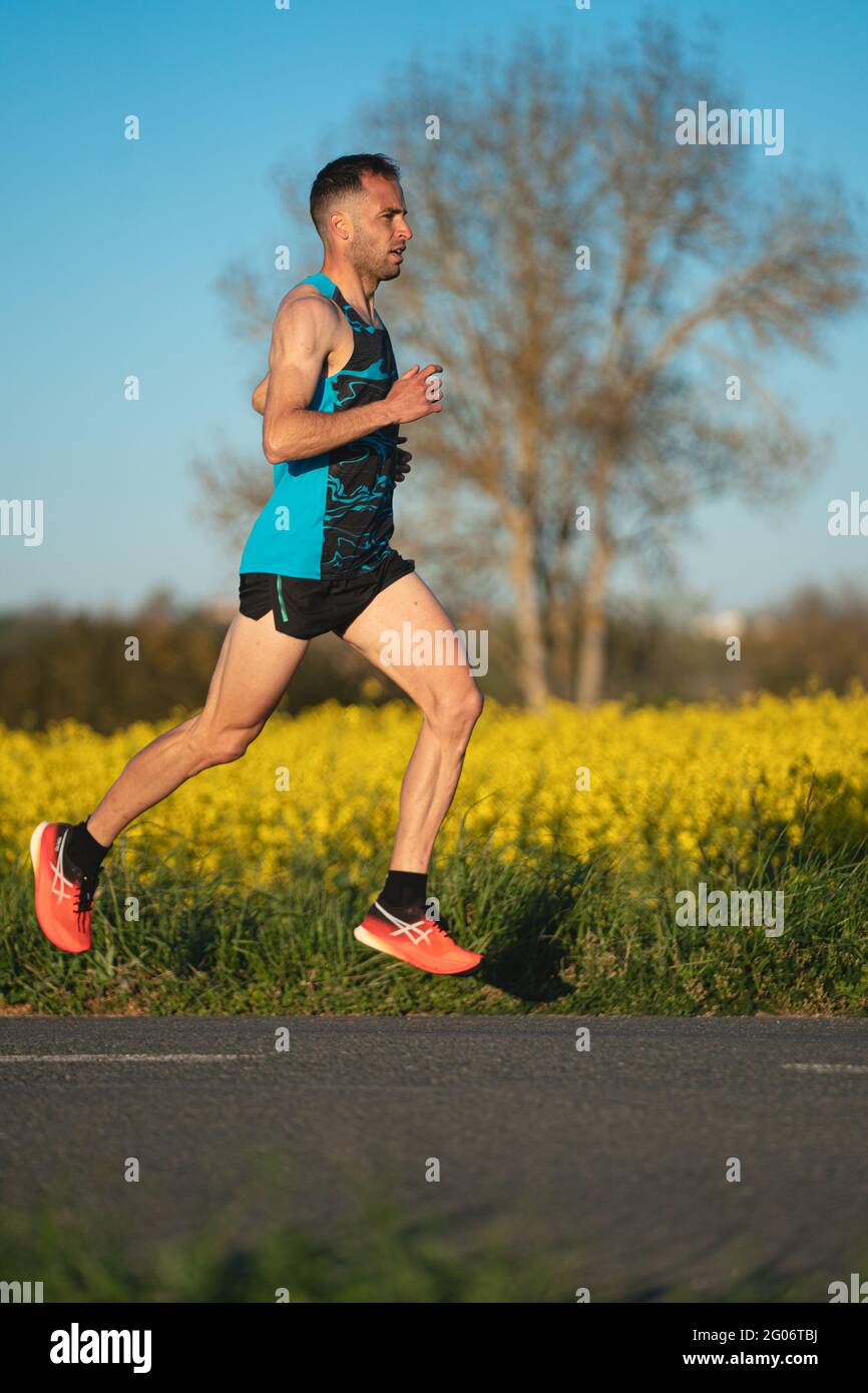 Runner running through his city, healthy and healthy lifestyle Stock ...