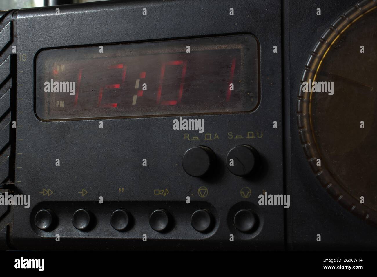 Old clock radio showing 12:01 Stock Photo