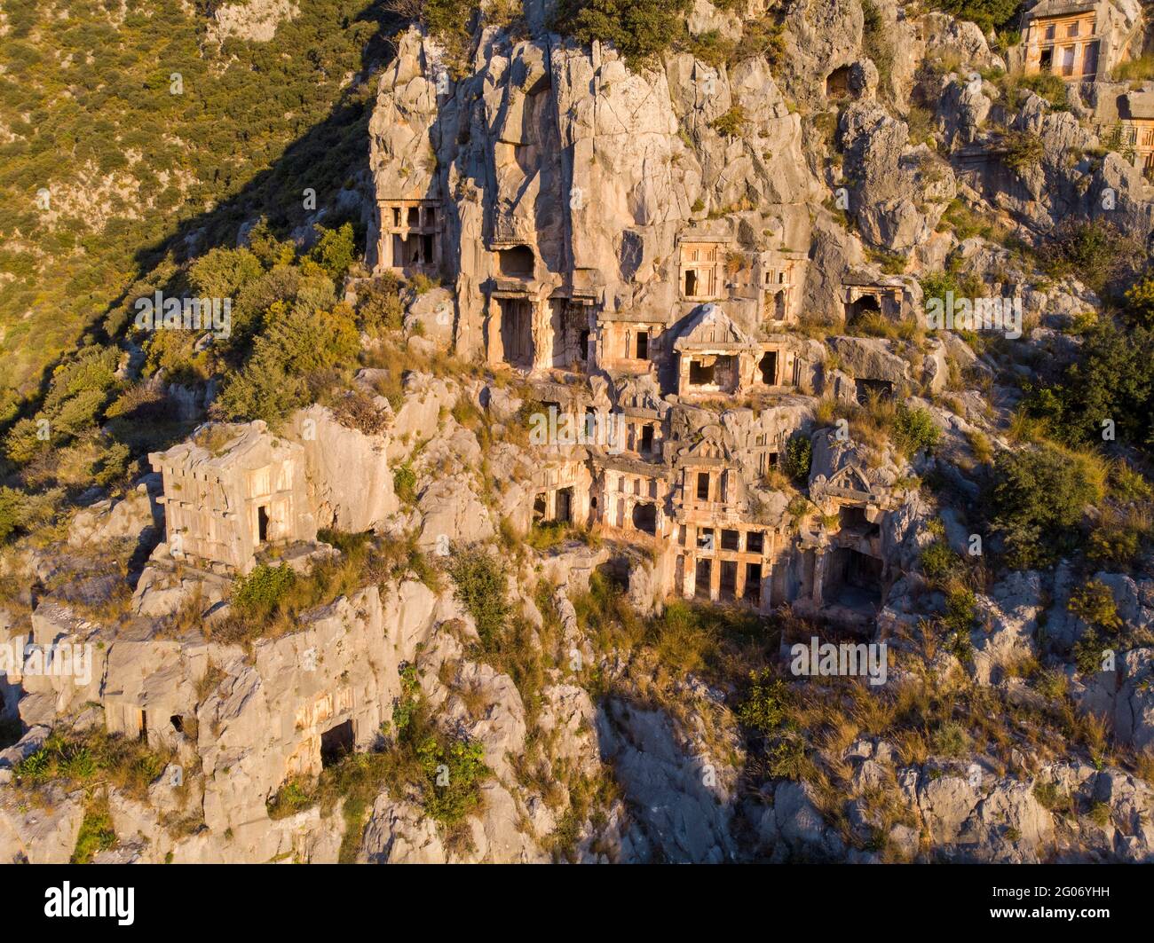 Aerial Shot Archeological remains of the Lycian rock cut tombs in Myra, Turkey Stock Photo