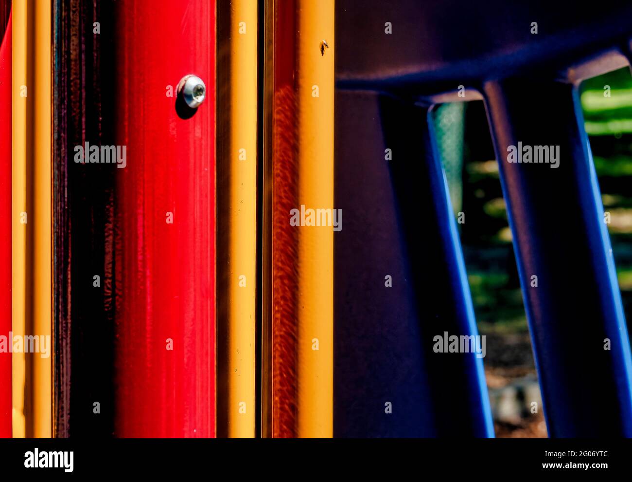Brightly colored metal posts, part of equipment at a children’s ...