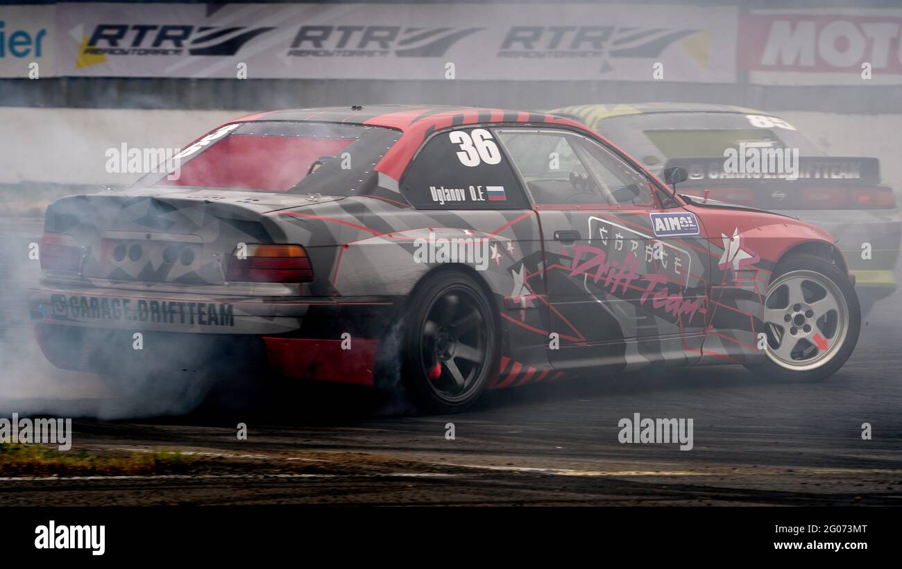 Red and grey BMW spinning on the track during the event.Festival Drift Expo  Track Mode runs on May 29-30 at ADM Raceway with the exhibition of projects  modified for drifting such as; '