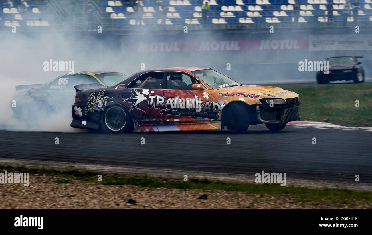 A turning black and orange car seen during the event.Festival Drift Expo  Track Mode runs on May 29-30 at ADM Raceway with the exhibition of projects  modified for drifting such as; 'Drift