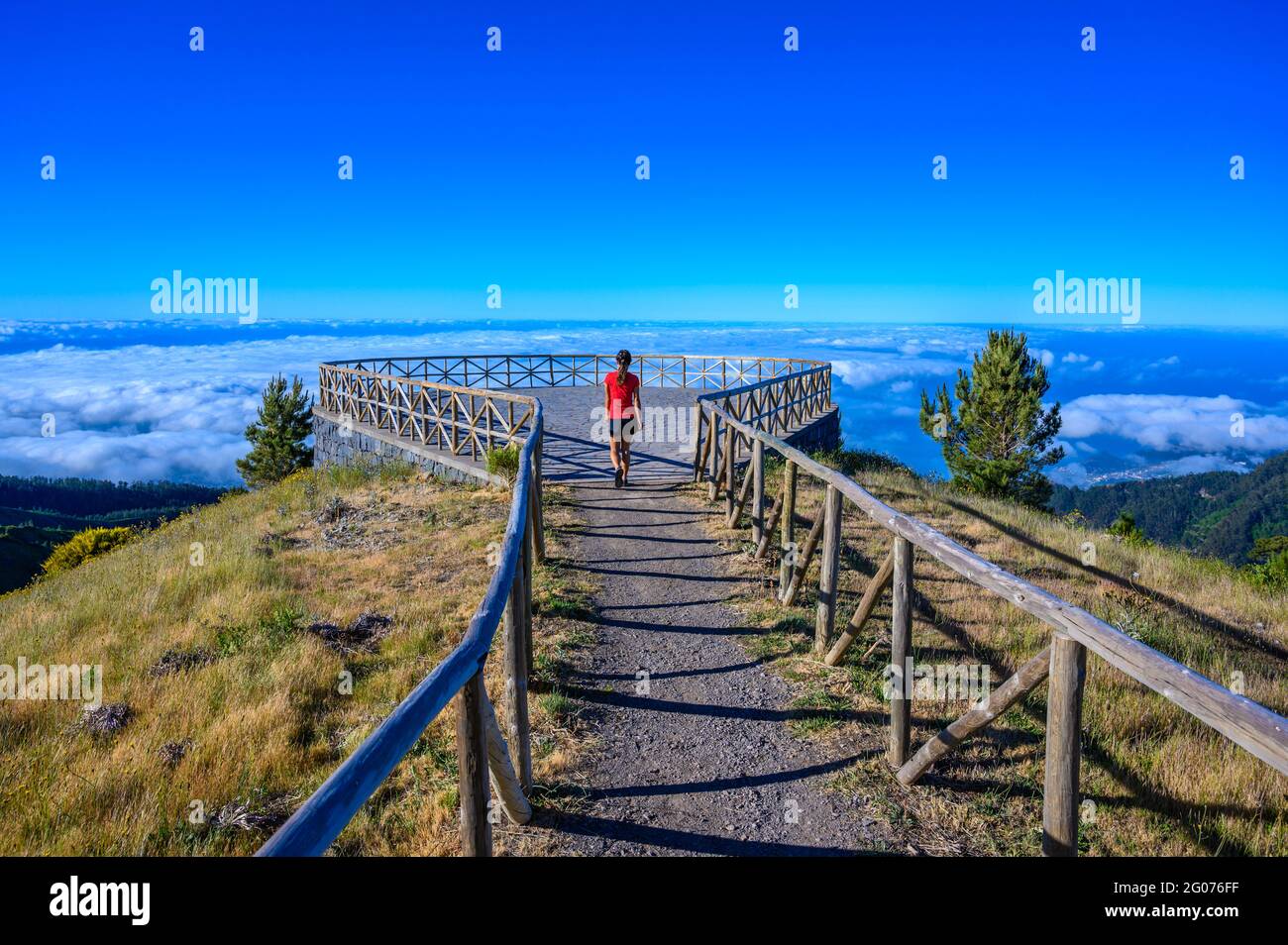 Hiker in Madeira Island - View Point of mountain scenery of the highland - tabove the clouds - ravel destination for outdoor sports - Portugal Stock Photo