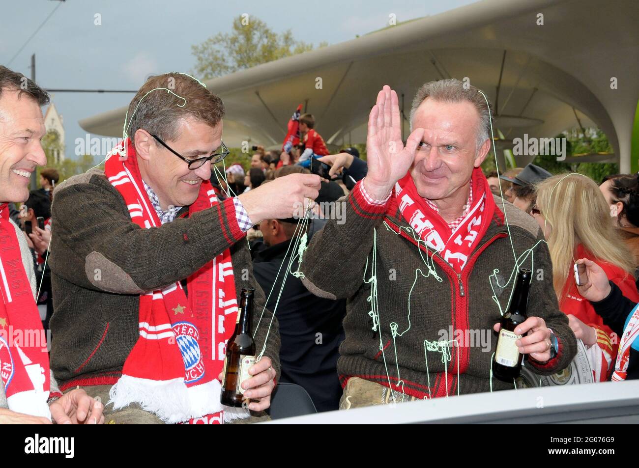 Andreas Jung, Jan-Christian Dreesen, Karl-Heinz Rummenigge and FC Bayern Munich fans celebrate the win of the German Football Championship 2013 Stock Photo