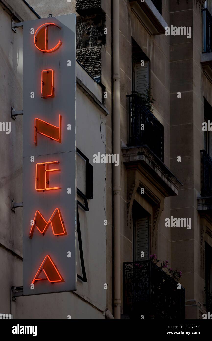 Close-up on a neon light shaped into the French word 'Cinéma'. Stock Photo