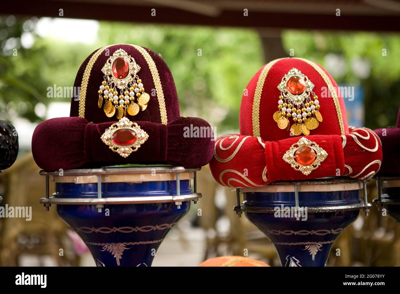 The streets of Istanbul sell  souvenirs like different type  of the traditional hats.  The sales stand in Istanbul. Stock Photo