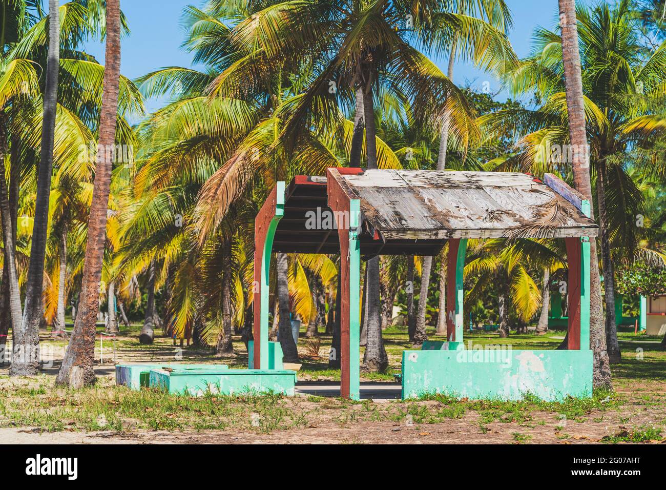 Depilated building damaged from hurricane on tropical beach park Stock Photo