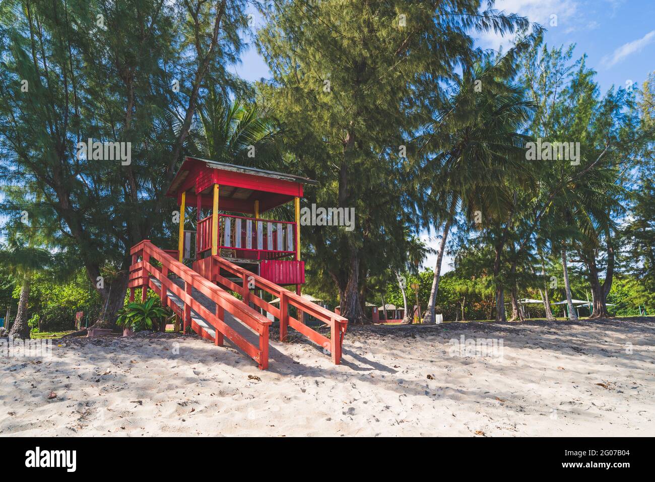 Red Lifeguard hut along shore of Seven Sea beach in tropical Fajardo Puerto Rico Stock Photo