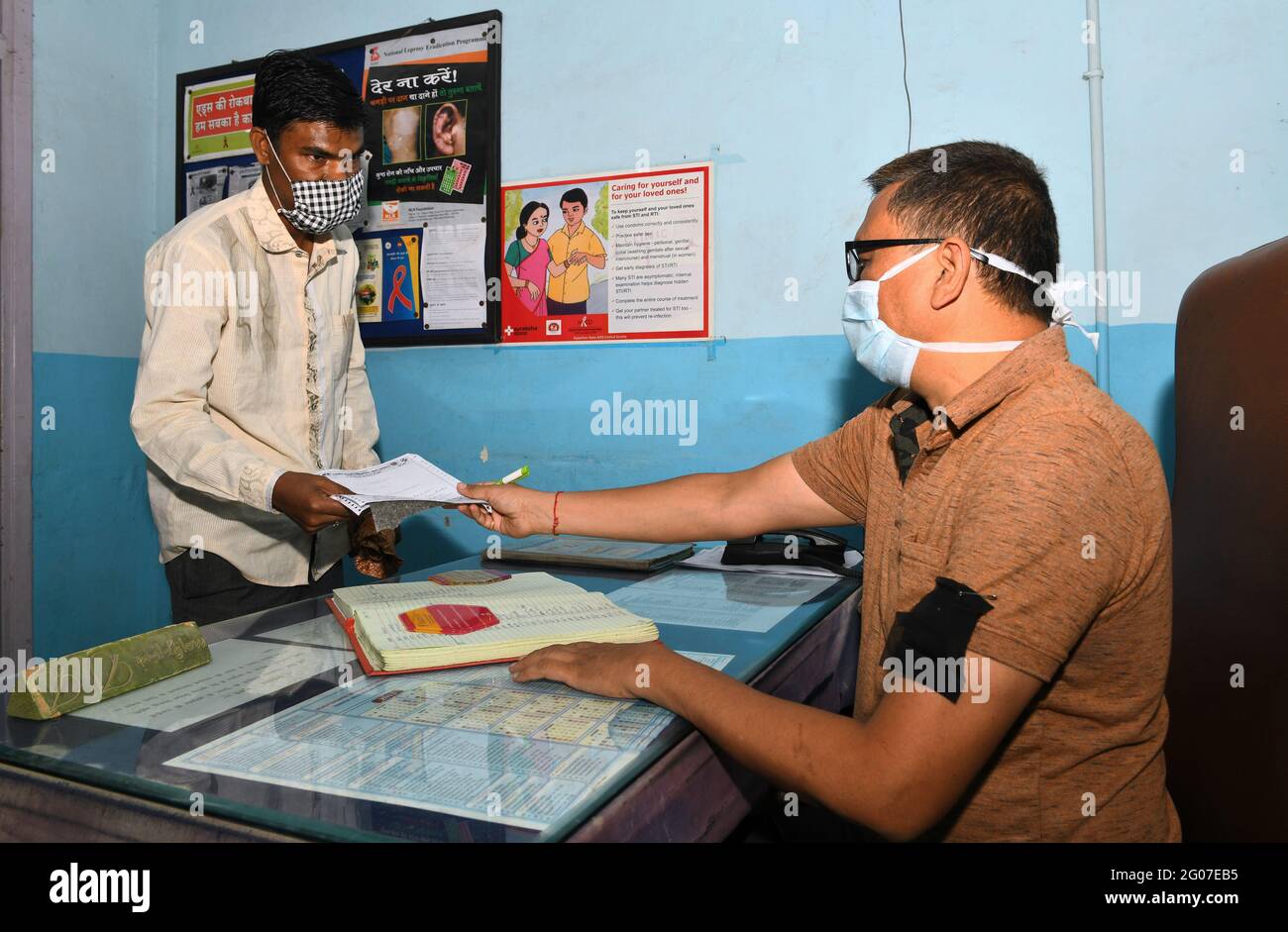 Indian doctor treating patient hi-res stock photography and images - Alamy