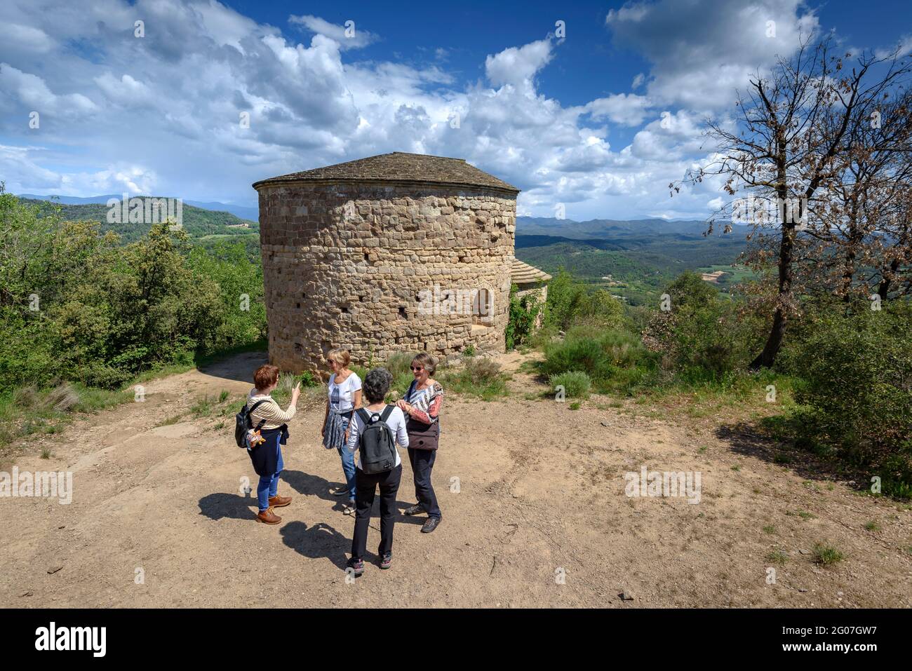 Views from the hill of the Lluçà castle with the Sant Vicenç de Lluçà hermitage in the foreground (Osona, Barcelona, Catalonia, Spain) Stock Photo