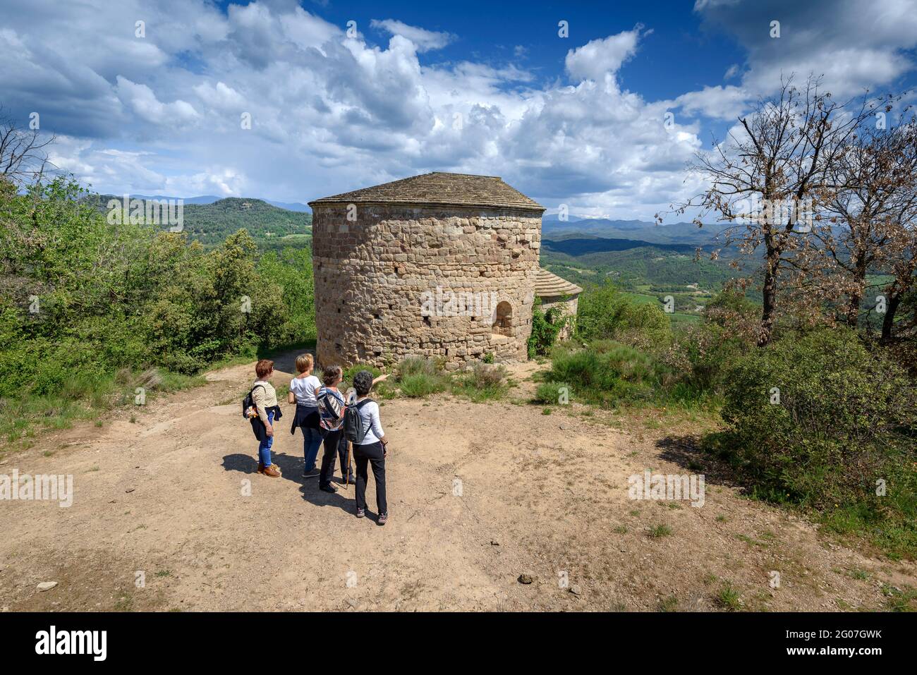 Views from the hill of the Lluçà castle with the Sant Vicenç de Lluçà hermitage in the foreground (Osona, Barcelona, Catalonia, Spain) Stock Photo