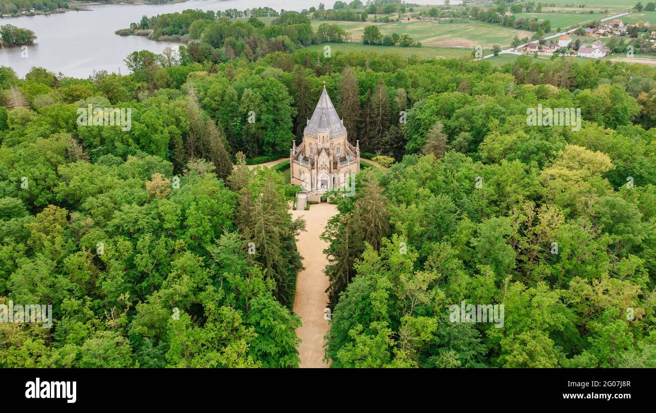 Aerial drone view of Schwarzenberg Tomb near Trebon, Czech Republic.Neo-gothic building with tower and majestic double staircase is surrounded by park Stock Photo