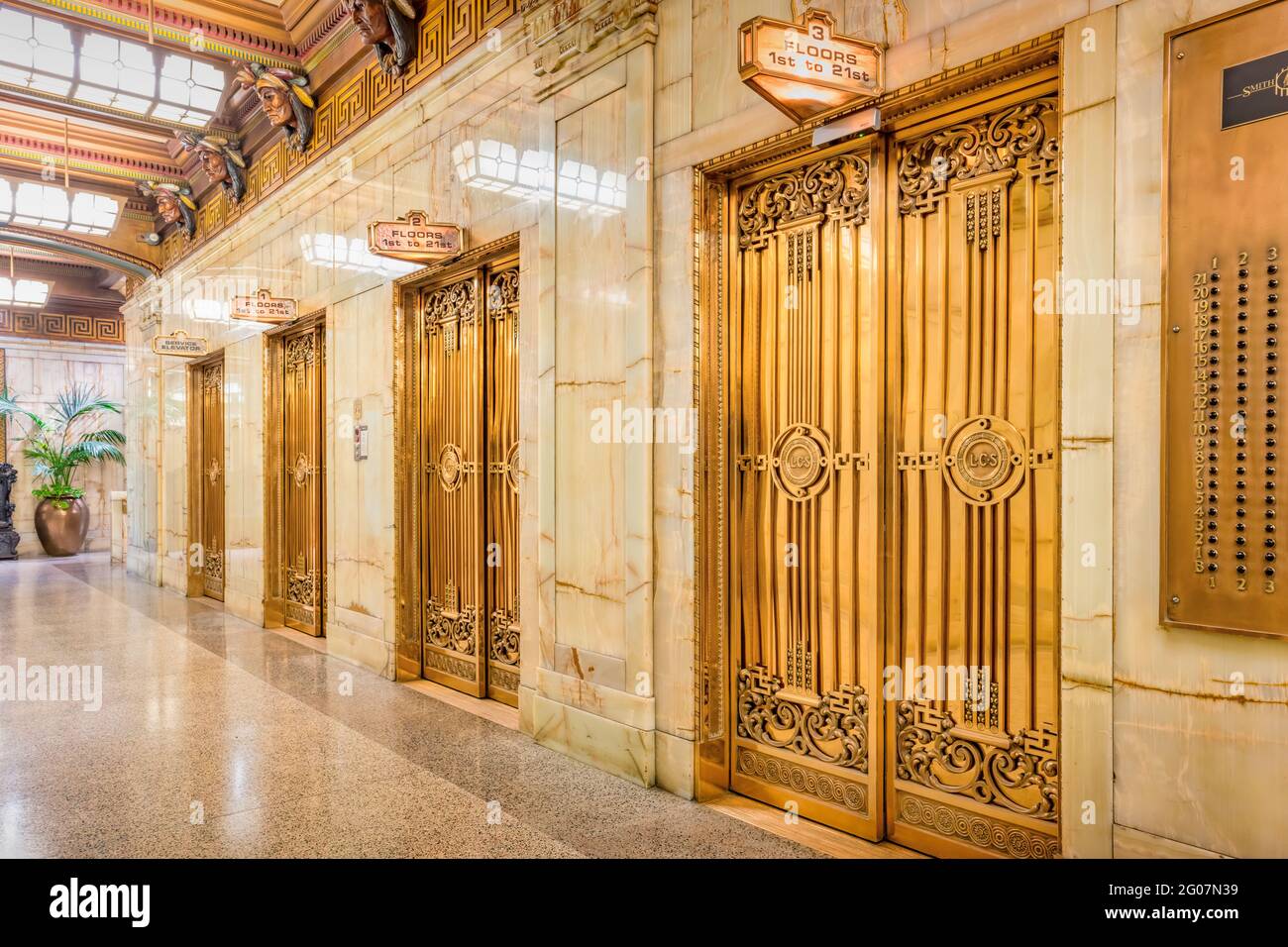 Lobby with elevators in the historic Smith Tower in downtown Seattle Washington USA Stock Photo