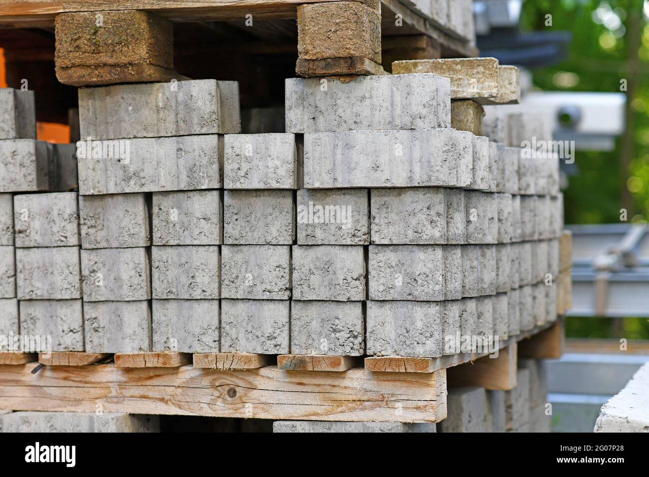Gray cobble stones on palette at construction site Stock Photo
