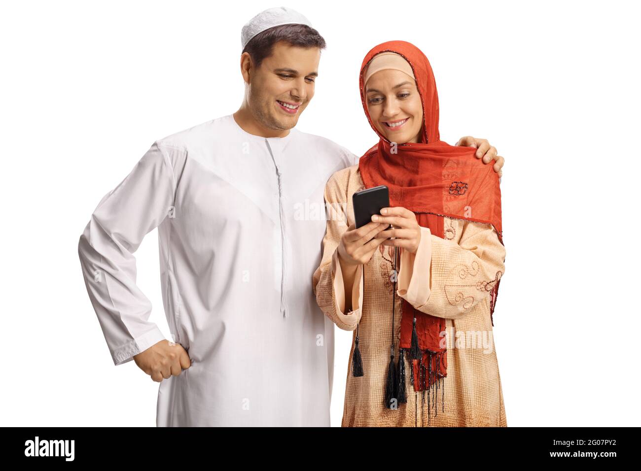 Young muslim man and woman using a smartphone isolated on white background Stock Photo