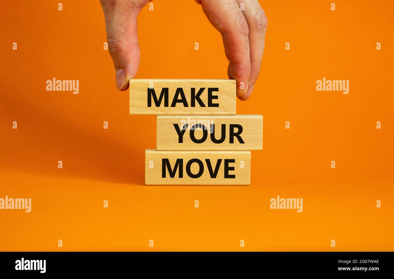 Make your move symbol. Wooden blocks with words 'Make your move ...