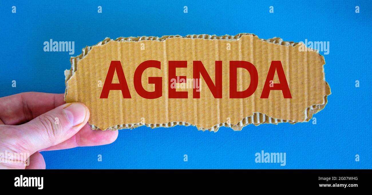 Agenda and business symbol. The concept word 'agenda' on the piece of ...