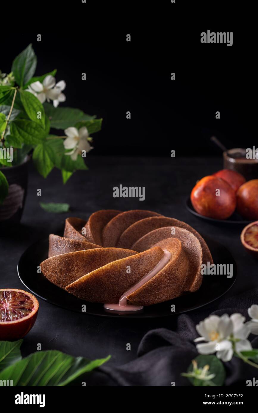 Dessert made from sanguine in a spiral shape on the table in a decorative way Stock Photo