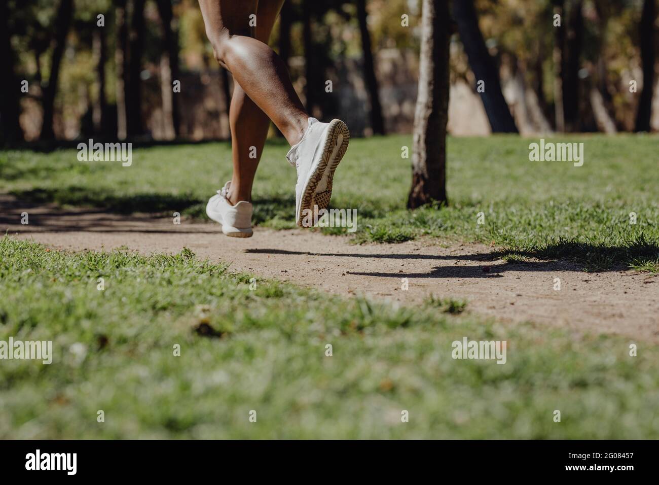African american woman running nature hi-res stock photography and ...