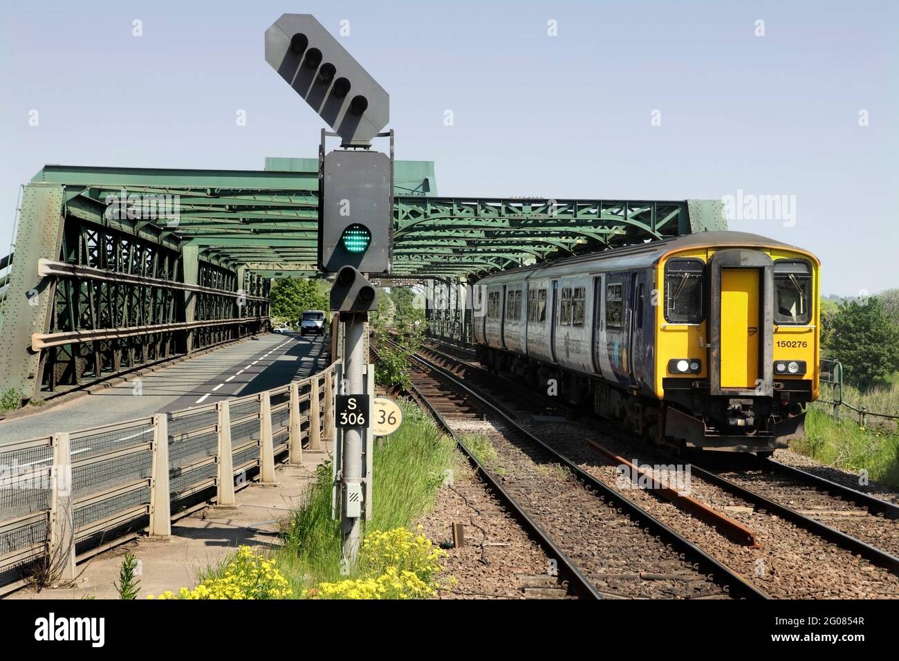 Northern Trains Class 150 Sprinter 150276 with the 2P16 1448 Scunthorpe to Doncaster service at Althorpe, Lincs heading from Keadby Bridge on 1/6/21. Stock Photo