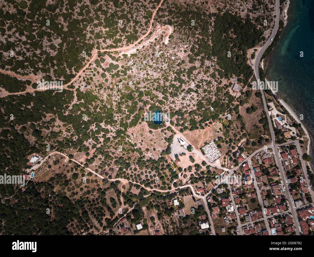 Drone shot very high above the Melissani cave in Kefalonia Stock Photo