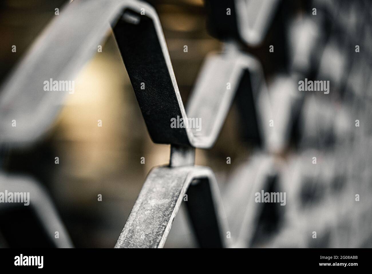 Selective focus of metal fences outdoors with a blurry background Stock ...