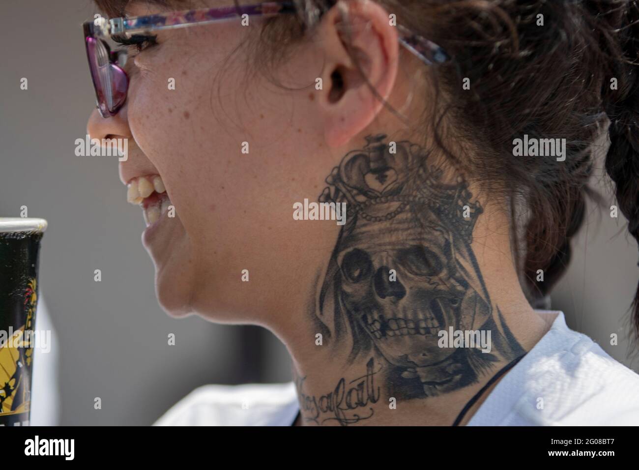 June 1, 2021, Mexico City, Mexico City, Mexico: A faithful with a tattoo of Santa Muerte, while arriving at the Altar of Santa Muerte in the town of Tepito, as part of the celebrations that held on the first day of each month, hundreds of devotees attend to venerate it, give thanks for the favors and the fulfilled promises that this deity has granted them. La Santa Muerte or Santisima Muerte is a popular Mexican figure who personifies death and is an object of worship, the devotees of her are usually perceived as people associated with crime, gang activity, prostitution, drug trafficking. On J Stock Photo