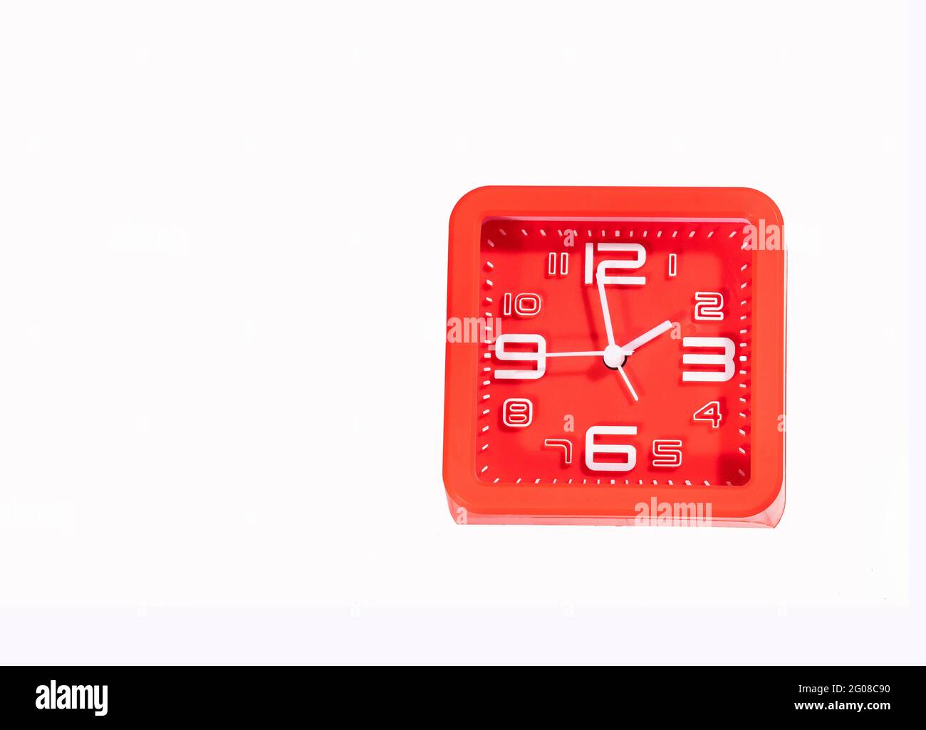 Red alarm clock isolated on white background Stock Photo - Alamy