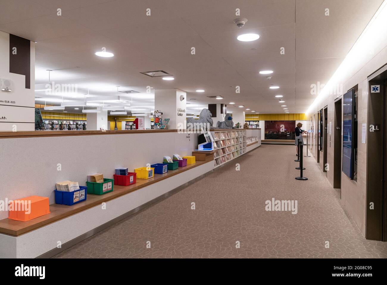 Interior view of children section of newly redesigned Stavros Niarchos Foundation Library with sculptures of iconic NYPL lions made LEGO bricks by artist Nathan Sawaya. After a delay because of COVID-19